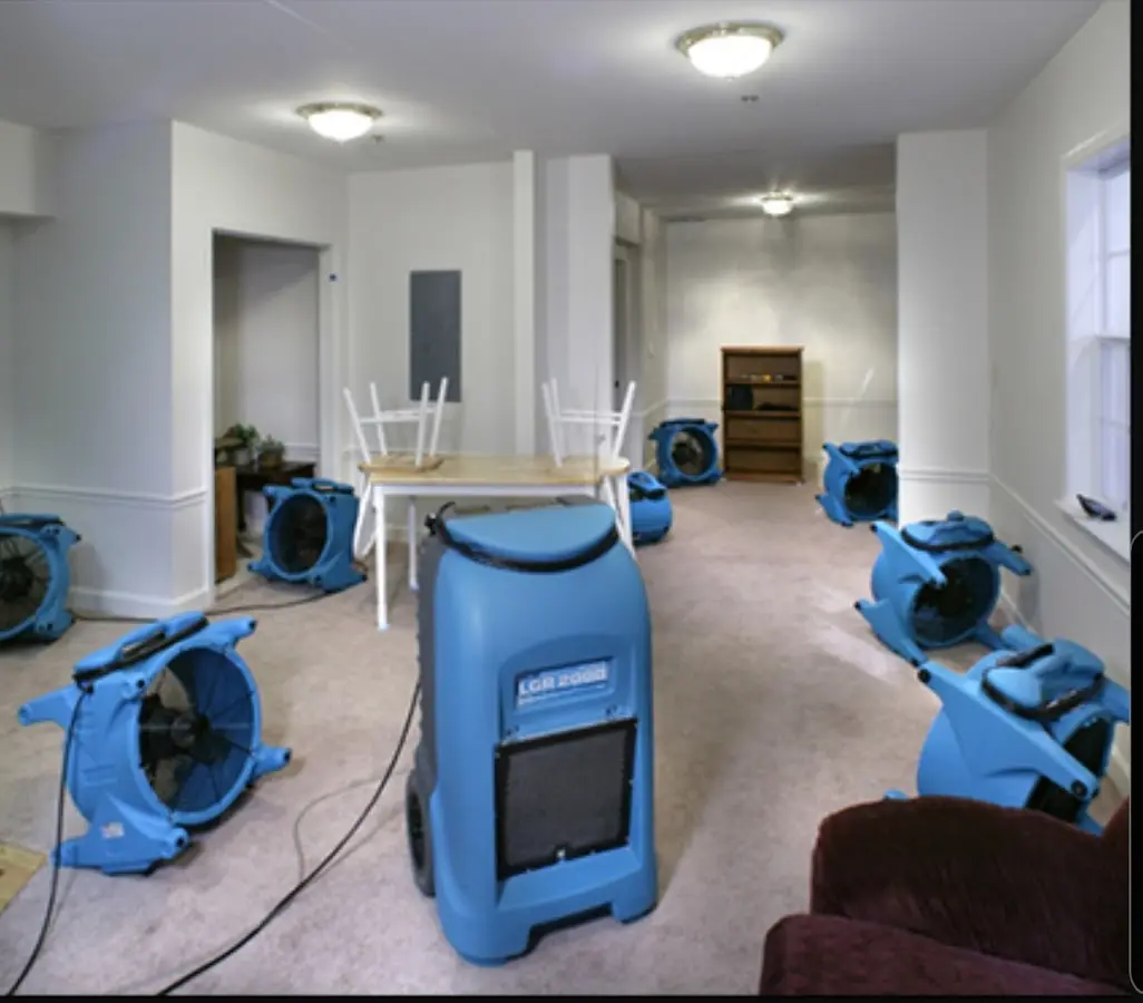 Air movers and dehumidifier setup for Water Damage Restoration in Makakilo